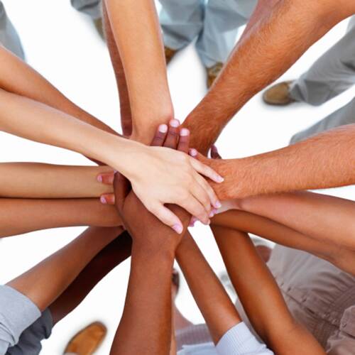 Einig in der Sache: Viele Hände liegen übereinander